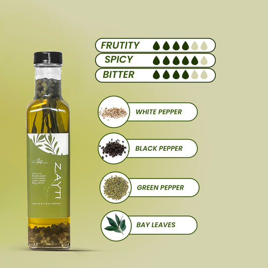 Extra Virgin Olive oil white black green pepper and bay leaves