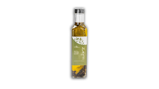Extra Virgin Olive oil white black green pepper and bay leaves